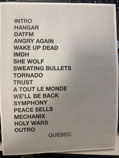 List of song titles including "INTRO," "HANGAR," "TORNADO," and "OUTRO."