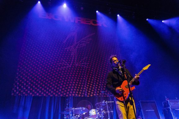 Big Wreck - Centre Videotron Musician performing on stage with guitar and blue lighting in the background.
