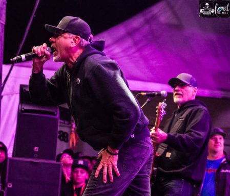 Pennywise - Red Bridge Fest 2026 A singer passionately performs on stage while a guitarist plays behind him.