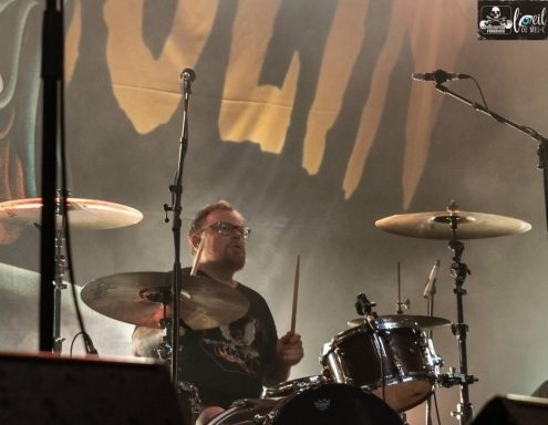 Millencolin - Red Bridge Fest 2026 A drummer performing on stage with a large banner in the background.