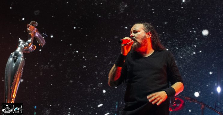 Korn - Quebec, city Singer performing on stage with dramatic lighting and effects in the background.