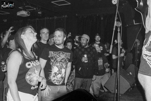 Straightline - L'Anti-Bar & Spectacles A crowd at a concert, with enthusiastic fans enjoying the performance.