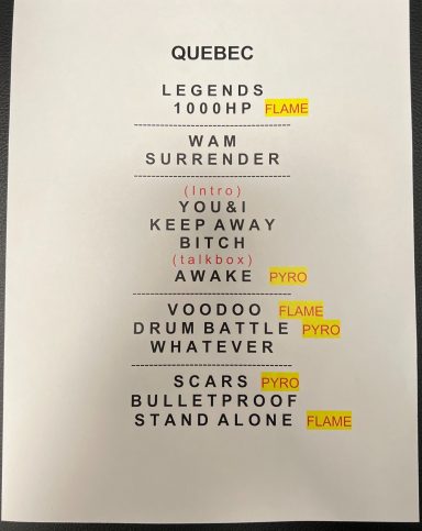 List of song titles and artists, marked with the word "FLAME" in yellow.